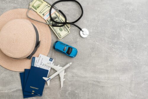 Airplane in flight with a medical mask. Concept - observance of safety on the plane. Traveling by air at social distance. Compliance with the recommendations of doctors on trips. Opening borders